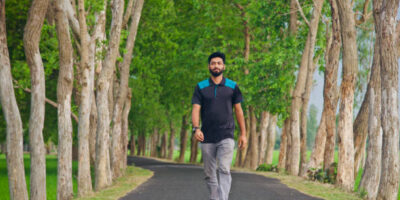 Bearded man walking in an urban street unique photo
